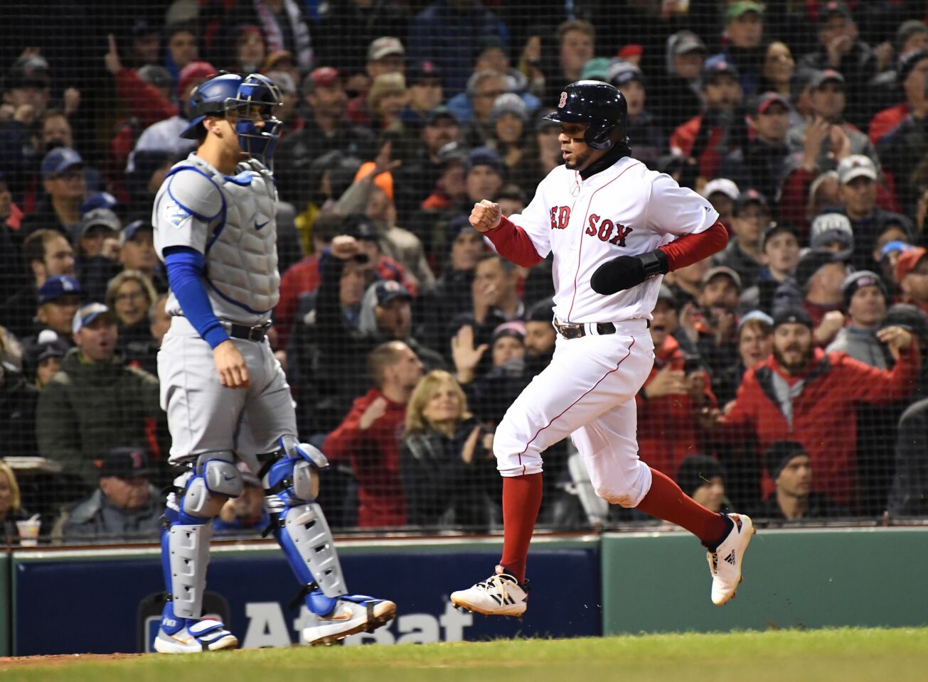 Red Sox's Xander Bogaerts scores on a single by Ian Kinsler in the first inning.