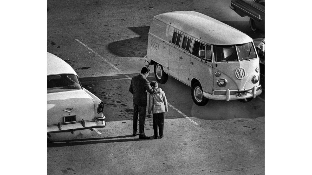 Jan. 13, 1965: Singer Vic Damone talks with his upset son, Perry, 9, outside a Santa Monica courthouse after judge awarded custody of the boy to Damone's ex-wife, actress Pier Angeli.