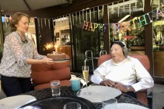Morrie Markoff at his 108th birthday celebration with his daughter-in-law, Jadwiga.