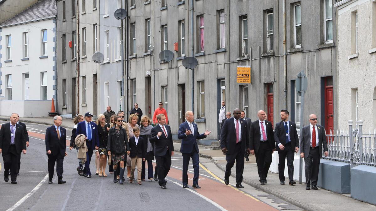 Vice President Joe Biden visits with local residents in Ballina during a tour of County Mayo, Ireland, on Wednesday.