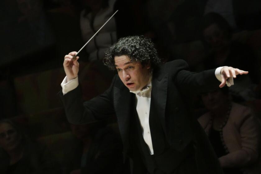 Gustavo Dudamel conducts the Los Angeles Philharmonic during a recent performance at Disney Hall.