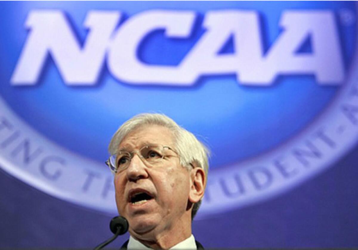 As NCAA president, Myles Brand held athletic departments publicly accountable for scholastic performance. Earlier, as president of Indiana University, he was hung in effigy after dismissing Bob Knight, the famed basketball coach.