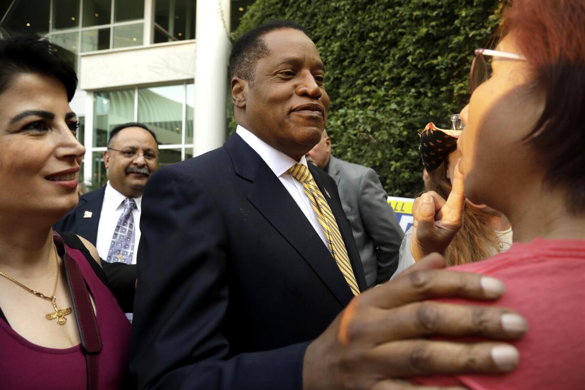Republican candidate for governor Larry Elder greets supporters in Woodland Hills on Aug. 10. 