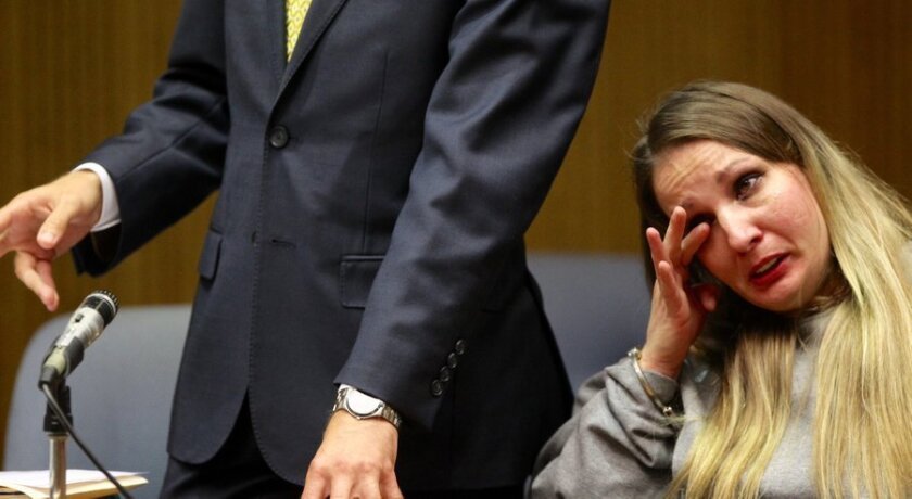 Brandy Teague reacts during her sentencing for vehicular manslaughter. She drove under the influence of drugs and caused a crash in El Cajon, Calif., that killed her 3-year-old daughter.
