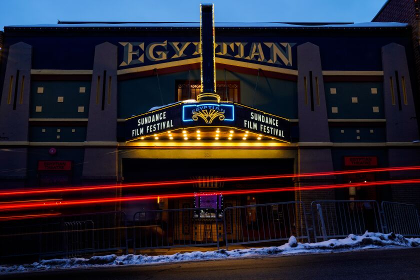 PARK CITY, UTAH - JANUARY 22: Traffic streaks by along main street outside the Egyptian Theater on Wednesday, Jan. 22, 2020 in Park City, Utah. The 2020 Sundance Film Festival kicks off Thursday, Jan. 23. (Kent Nishimura / Los Angeles Times)