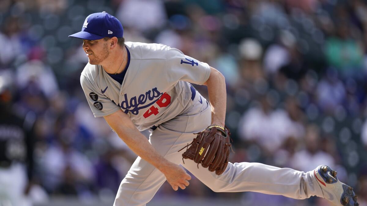 Pitcher Maddux rejoins Dodgers from the Padres