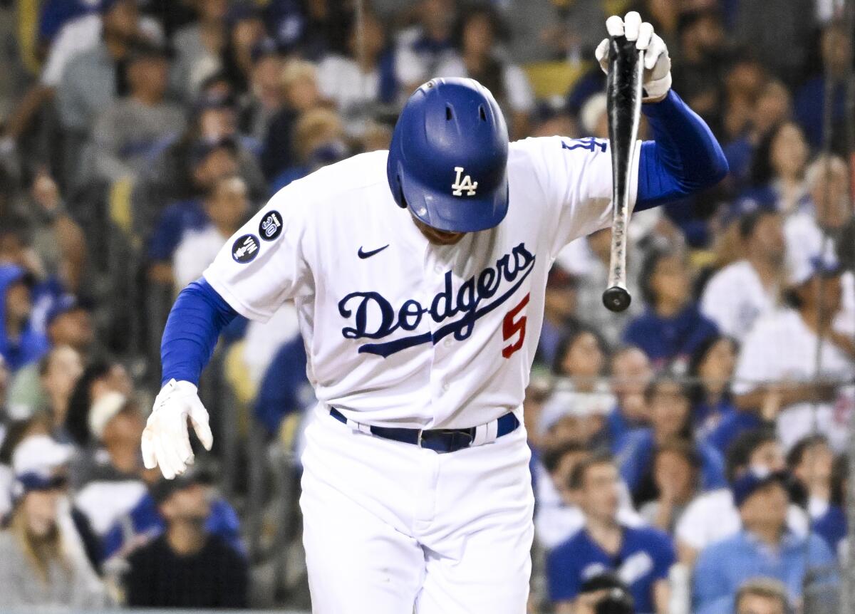 Dodgers first baseman Freddie Freeman reacts after flying out during the fifth inning.