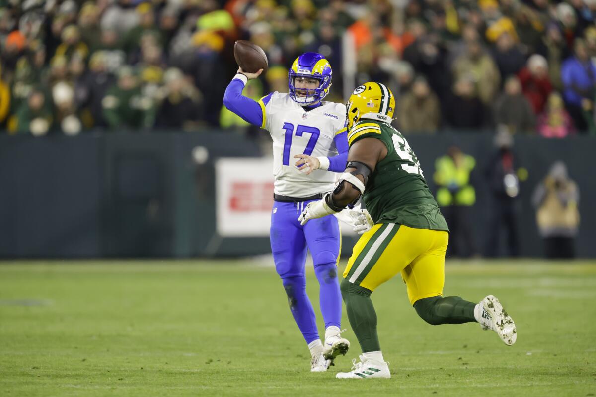 Rams quarterback Baker Mayfield looks to pass against the Green Bay Packers on Dec. 19, 2022.