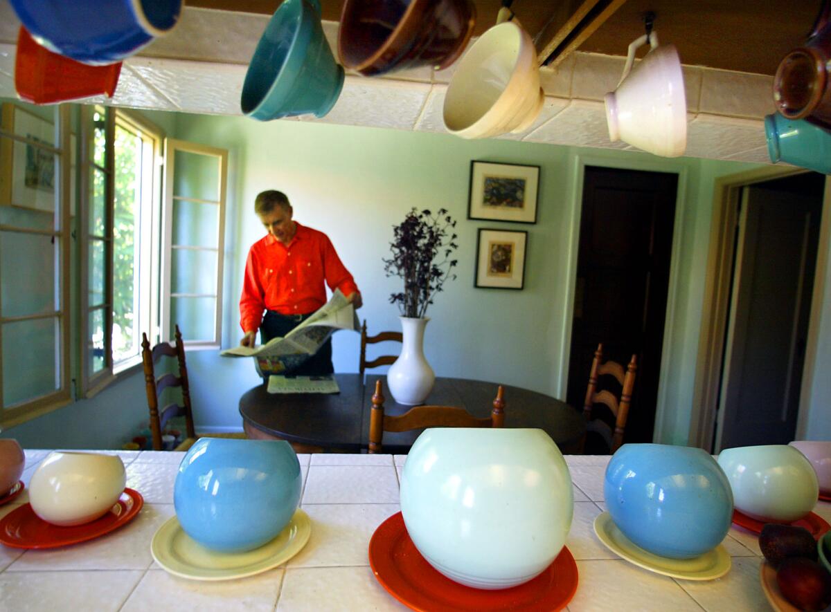 Curator Bill Stern in his Los Angeles home in 2003.