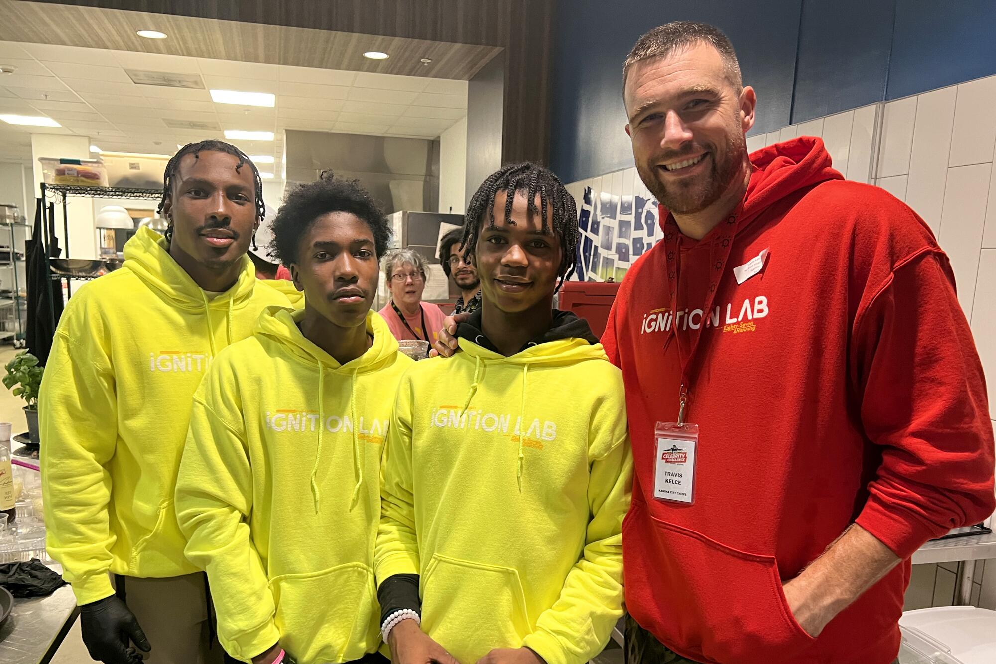 The Chiefs' Travis Kelce  interacts with students in the Ignition Lab at the Operation Breakthrough facility in Kansas City.