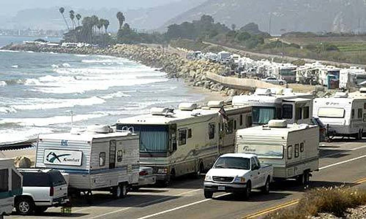 RVs gather at Rincon in Ventura County. Comfort is trumping fuel costs. RV rentals rose 22% this year.