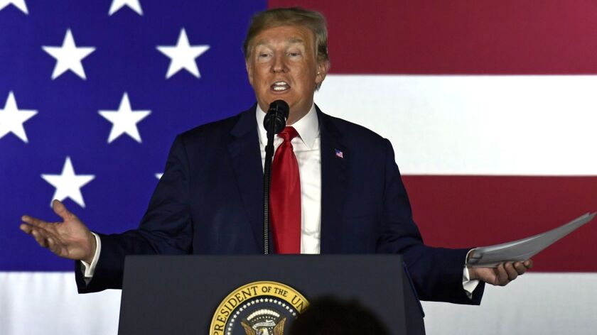 President Trump speaks at a fundraiser in Fargo, N.D., on Friday.