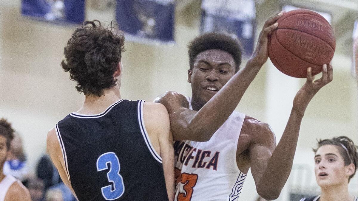 Judah Brown, shown playing against Dana Hills High on Thursday, had 19 points, 11 rebounds and eight blocks as Pacifica Christian Orange County beat Lancaster Quartz Hill on Saturday to advance to the CIF Southern Section Division 4AA title game.