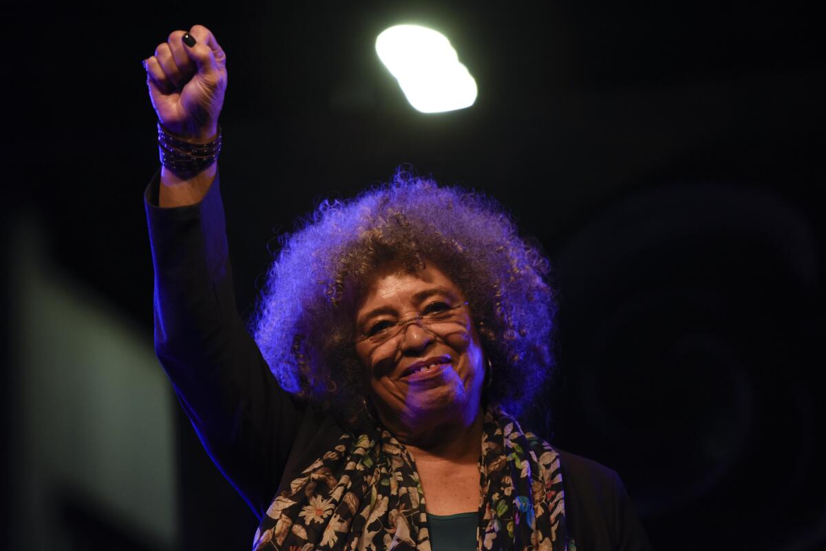 American political activist Angela Davis speaks during an open air rally