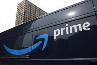 FILE - An Amazon Prime delivery vehicle is seen in downtown Pittsburgh on March 18, 2020. The Federal Trade Commission sued Amazon on Wednesday for what it called a years-long effort to enroll consumers without consent into its Prime program and making it difficult for them to cancel their subscriptions. (AP Photo/Gene J. Puskar, File)