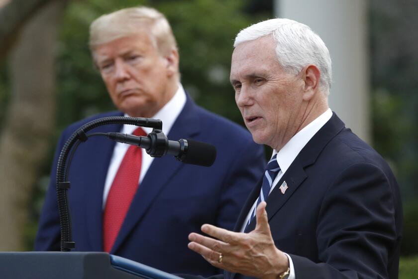 FILE - President Donald Trump listens as Vice President Mike Pence speaks during a briefing at the White House, March 29, 2020, in Washington. In an interview with Fox News Channel Friday, March 15, 2024, Pence said he will not be backing Donald Trump in the 2024 election. "It should come as no surprise that I will not be endorsing Donald Trump this year," he said. (AP Photo/Patrick Semansky, File)