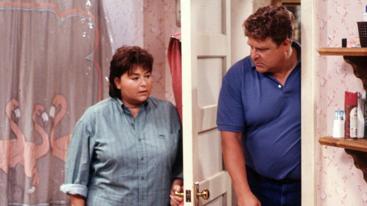 Barr opposite John Goodman, who played her husband on the show.