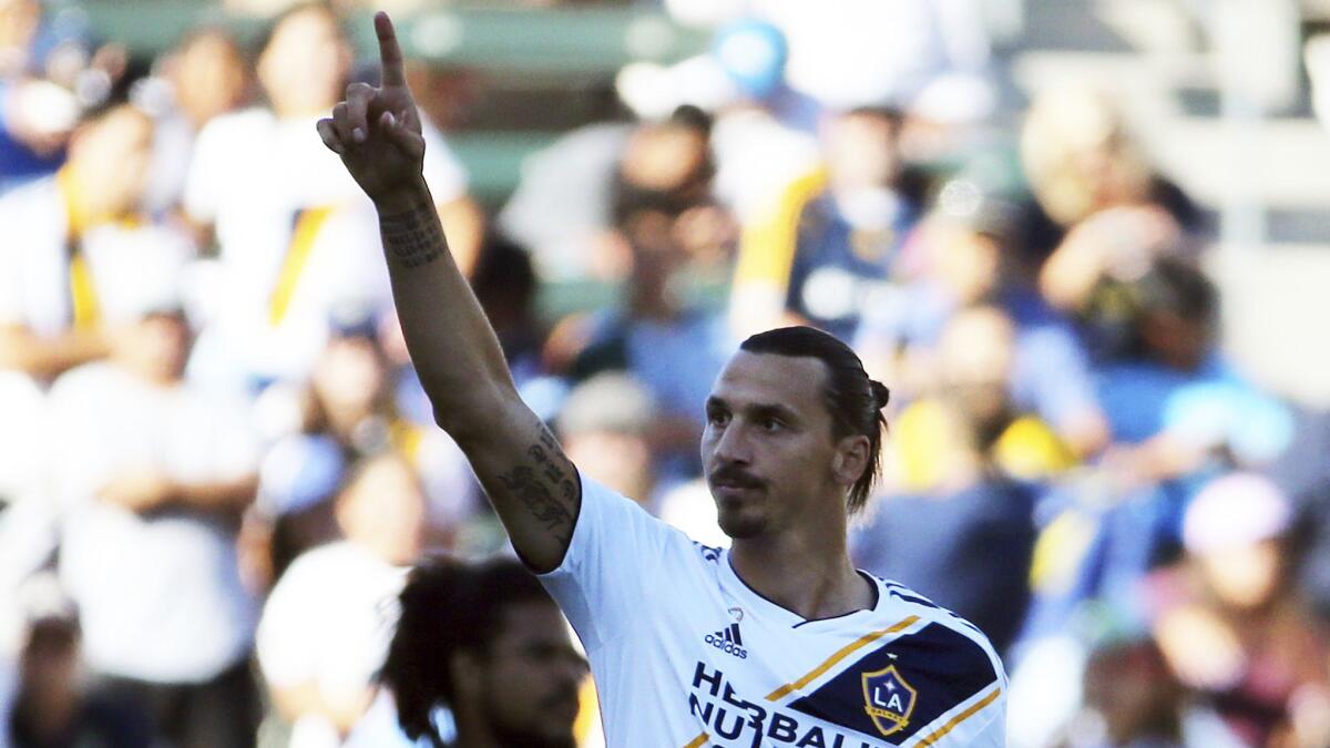 Galaxy forward Zlatan Ibrahimovic celebrates his goal against the Seattle Sounders in the first half in Carson on Sept. 23.