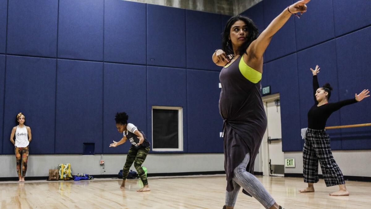 Jannet Galdamez, from left, Jasmine Stanley, Isis Avalos and Bianca Medina rehearse.