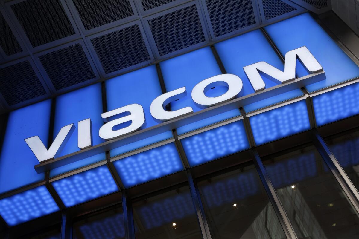 FILE - In this Wednesday, Dec. 2, 2015, file photo, the Viacom logo adorns the mass media company's headquarters, in New York. ViacomCBS’s first-quarter net income beat expectations, Thursday, May 6, 2021, on strong streaming revenue during a quarter when the company streamed the Super Bowl and introduced its rebranded streaming service Paramount+. ViacomCBS rebranded its streaming service formerly called CBS All Access to Paramount+ in March. (AP Photo/Mark Lennihan, File)