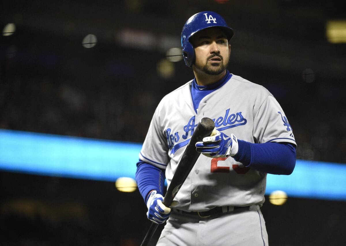 Dodgers first baseman Adrian Gonzalez stands in the on-deck circle during the seventh inning of a game Tuesday against the San Francisco Giants.