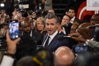 California Gov. Gavin Newsom speaks to reporters in the spin room after a presidential debate between President Joe Biden and Republican presidential candidate former President Donald Trump in Atlanta, Thursday, June 27, 2024.