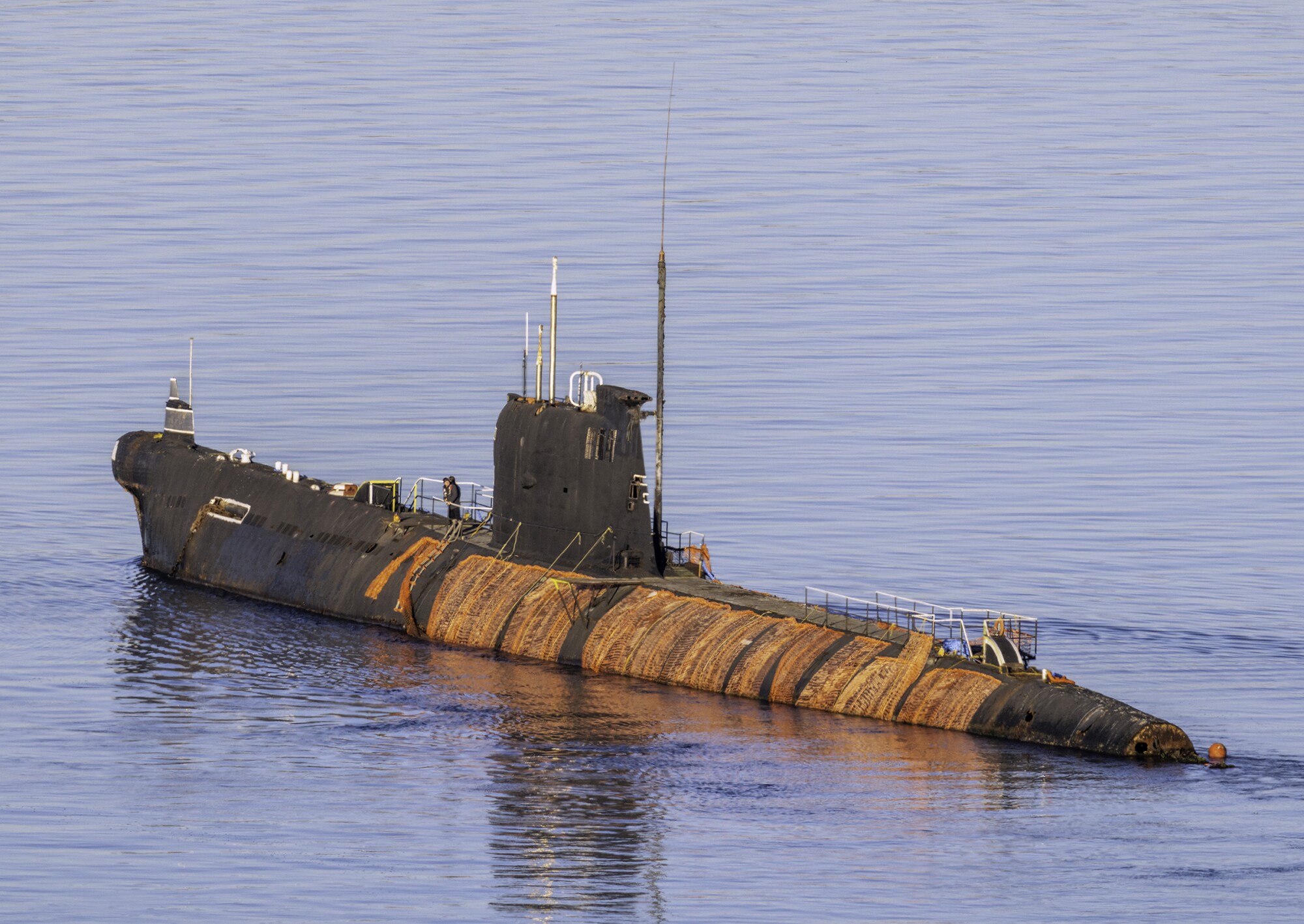 The Soviet submarine B-39 was towed out of San Diego Sunday.