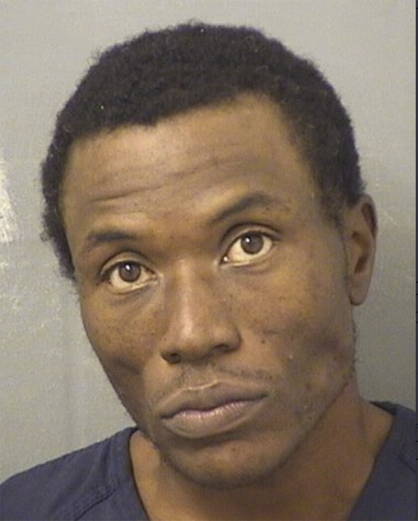 This photo provided by Palm Beach County Sheriff’s Office shows Semmie Lee Williams. Williams, 39, was arrested Wednesday, Dec. 1, 2021, in Miami on first-degree murder charges for the Nov. 15 slaying of Ryan Rogers, whose body was found alongside an Interstate 95 overpass the next day, said Palm Beach Gardens Chief Clinton Shannon.(Palm Beach County Sheriff’s Office via AP)