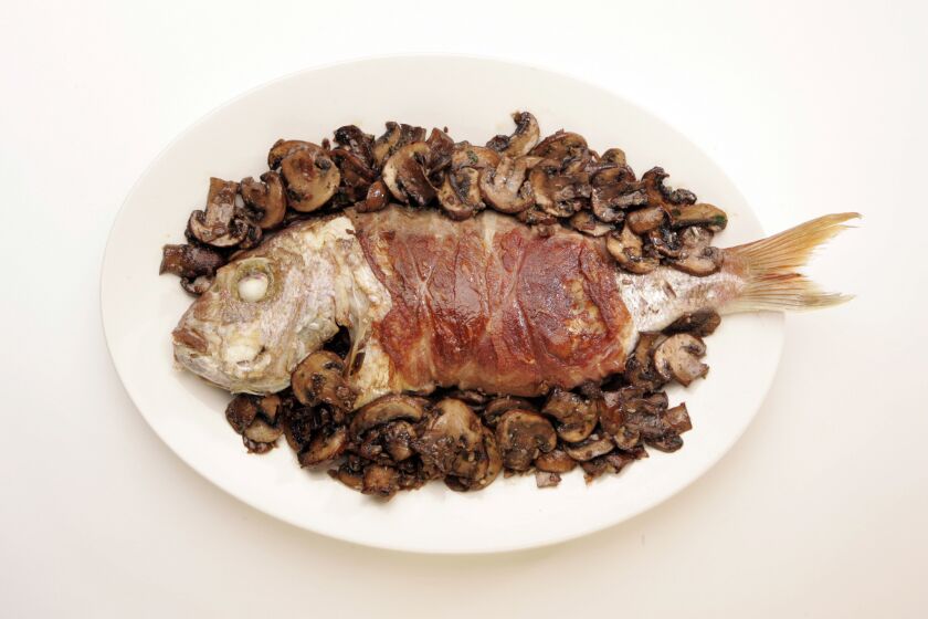 Cooking a whole fish doesn't just give you a beautiful plate, it's also fast and super easy. Recipe: Pan-roasted fish with prosciutto and mushrooms