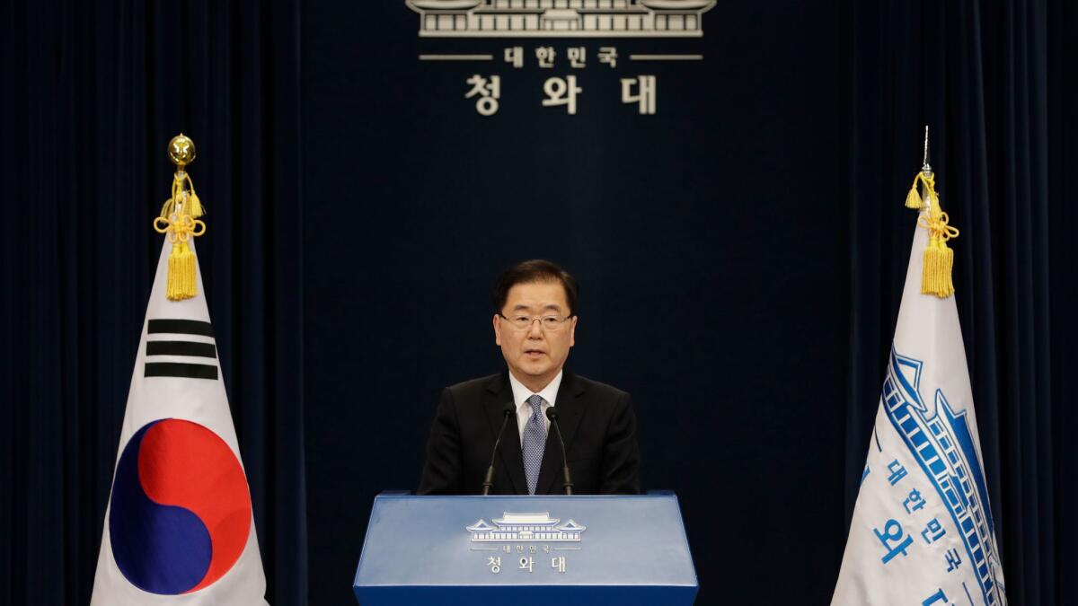 South Korean delegation head Chung Eui-yong speaks to the media at the presidential Blue House in Seoul, South Korea, Tuesday, after returning from North Korea.