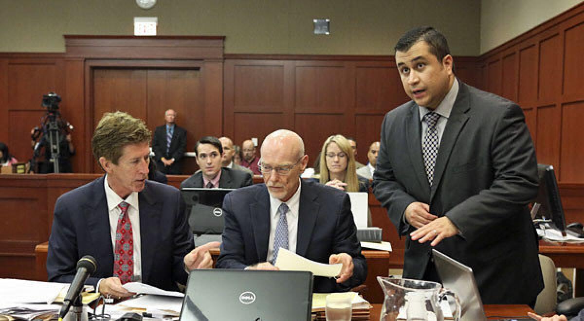 Standing next to his defense attorneys Mark O'Mara, left, and Don West, center, George Zimmerman addresses Judge Debra Nelson.