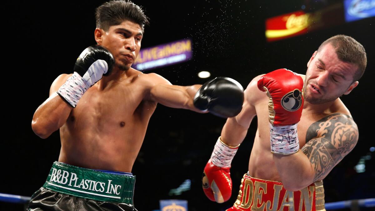 Mikey Garcia connects with a left jab against Dejan Zlaticanin during in a fight in January. Garcia, from Riverside, says he's content to box on regular network TV as opposed to pay-per-view.