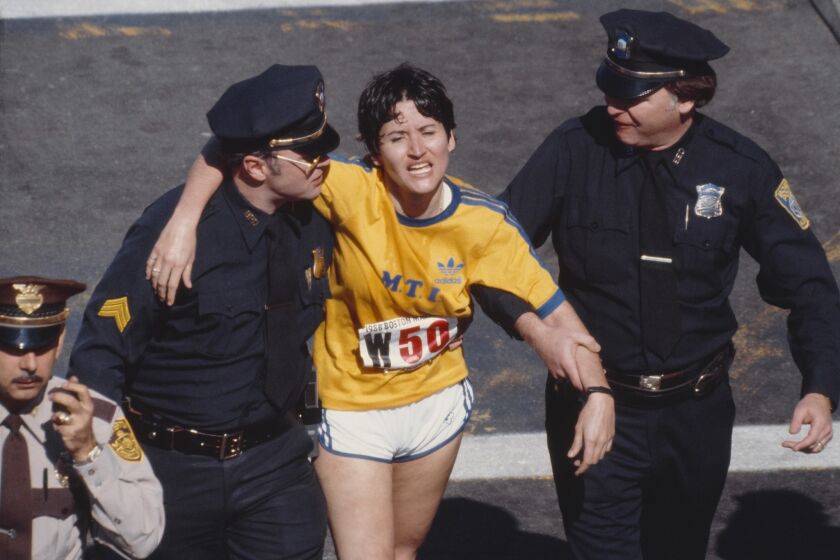BOSTON - APRIL 21: Rosie Ruiz is shown moments after crossing the finish line as the apparent women's race winner of the 84th Boston Marathon on April 21, 1980 in Boston, Massachusetts. Ruiz was later stripped of her race title after it was determined she had not run the entire race. (Photo by David Madison/Getty Images) *** Local Caption *** Rosie Ruiz