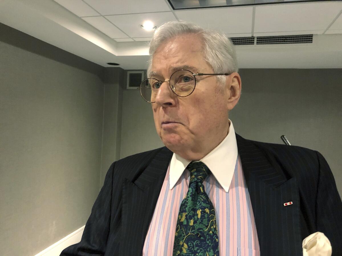 FILE - In this Oct. 9, 2019 file photo former West Virginia Supreme Court Chief Justice Richard Neely speaks in Charleston, W.Va. Neely, who lost a bid earlier this year to win a seat back on the court, died Sunday, Nov. 8, 2020, of liver cancer. He was 79. (AP Photo/John Raby, File)