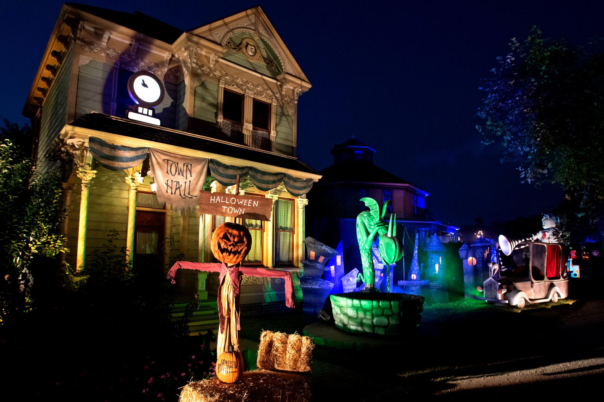 Heritage Square Museum at night, with Halloween decor