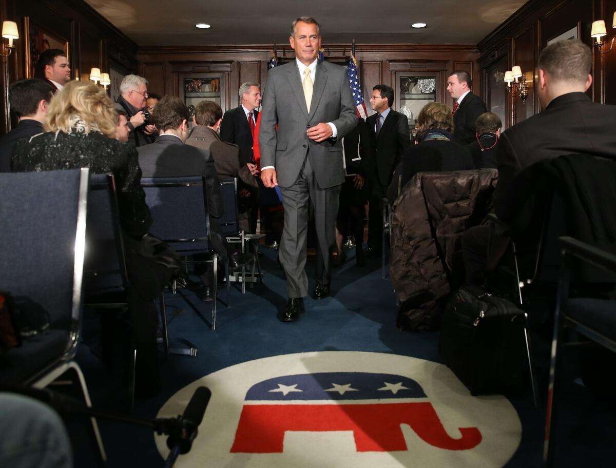 House Speaker John Boehner (R-Ohio) speaks to the media after attending the weekly House Republican conference on Capitol Hill.