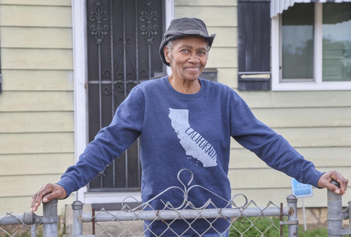 Dorothy Taylor, a resident since the 1970s, stands outside her home in the Mt. Hope neighborhood Wednesday