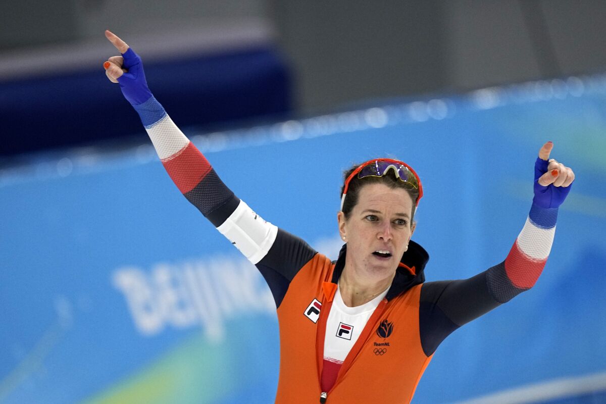 Ireen Wust of the Netherlands reacts after winning her heat and breaking an Olympic record in the women's speedskating 1,500-meter race at the 2022 Winter Olympics, Monday, Feb. 7, 2022, in Beijing. Her time stood for the gold medal. (AP Photo/Ashley Landis)