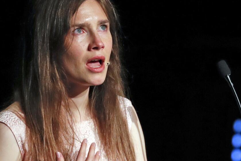 Amanda Knox gets emotional as she speaks at a Criminal Justice Festival at the University of Modena, Italy, Saturday, June 15, 2019. Knox, a former American exchange student who became the focus of a sensational murder case, arrived in Italy Thursday for the first time since an appeals court acquitted her in 2011 in the slaying of her British roommate. (AP Photo/Antonio Calanni)
