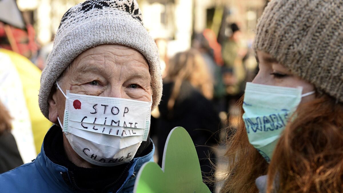 Activists protest against global warming in Katowice, Poland on Saturday.
