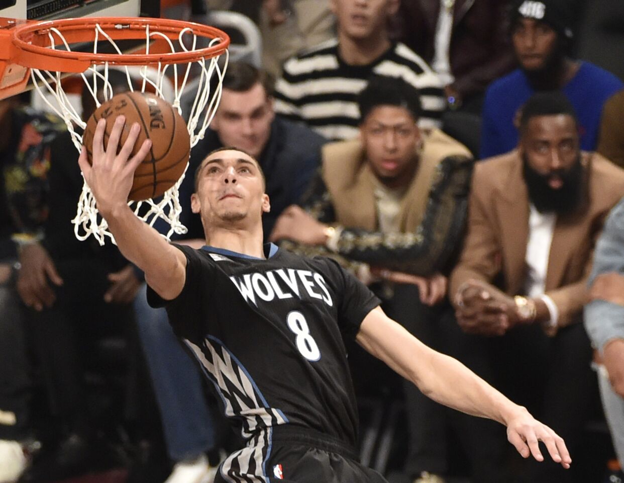 Timberwolves guard Zach LaVine attempts a reverse dunk during the contest Saturday in Toronto.