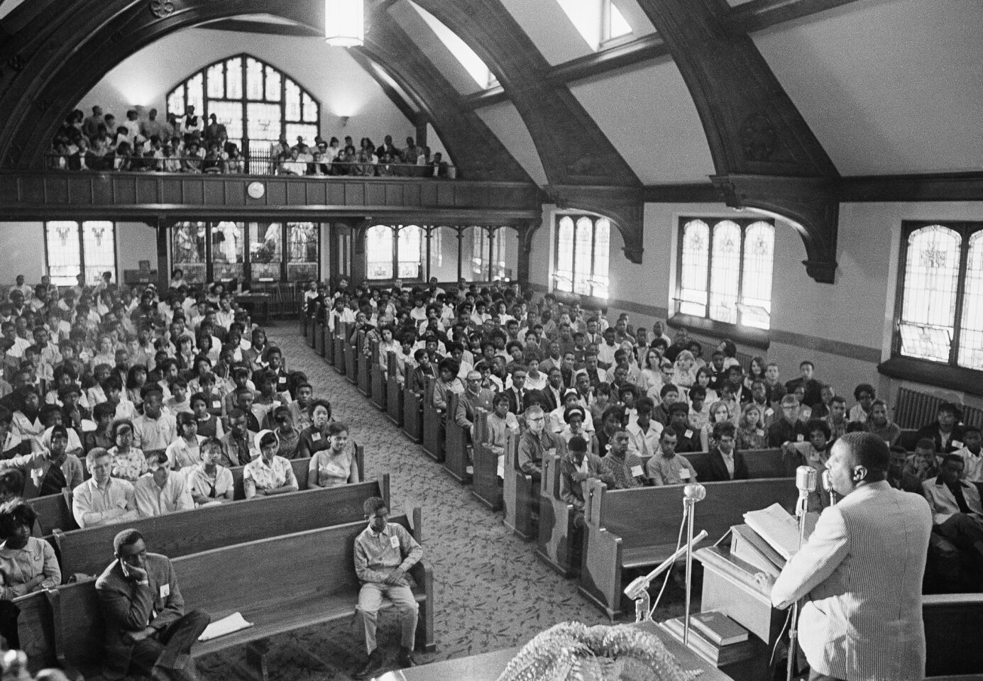 Comedian Dick Gregory addresses a group of youths at a Freedom School sponsored by the Christian Methodist Episcopal Church during a one-day boycott called by black leaders to protest de facto segregation at Milwaukee schoolsin 1964.