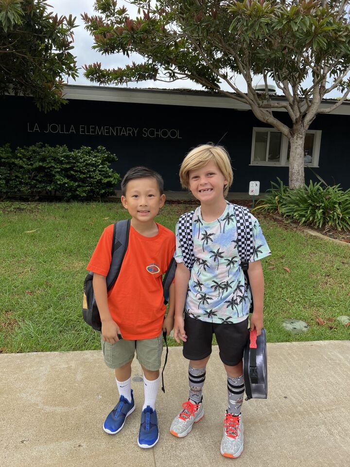 Second-graders Kailo Quach and Reeve McNutt are all smiles at La Jolla Elementary School.
