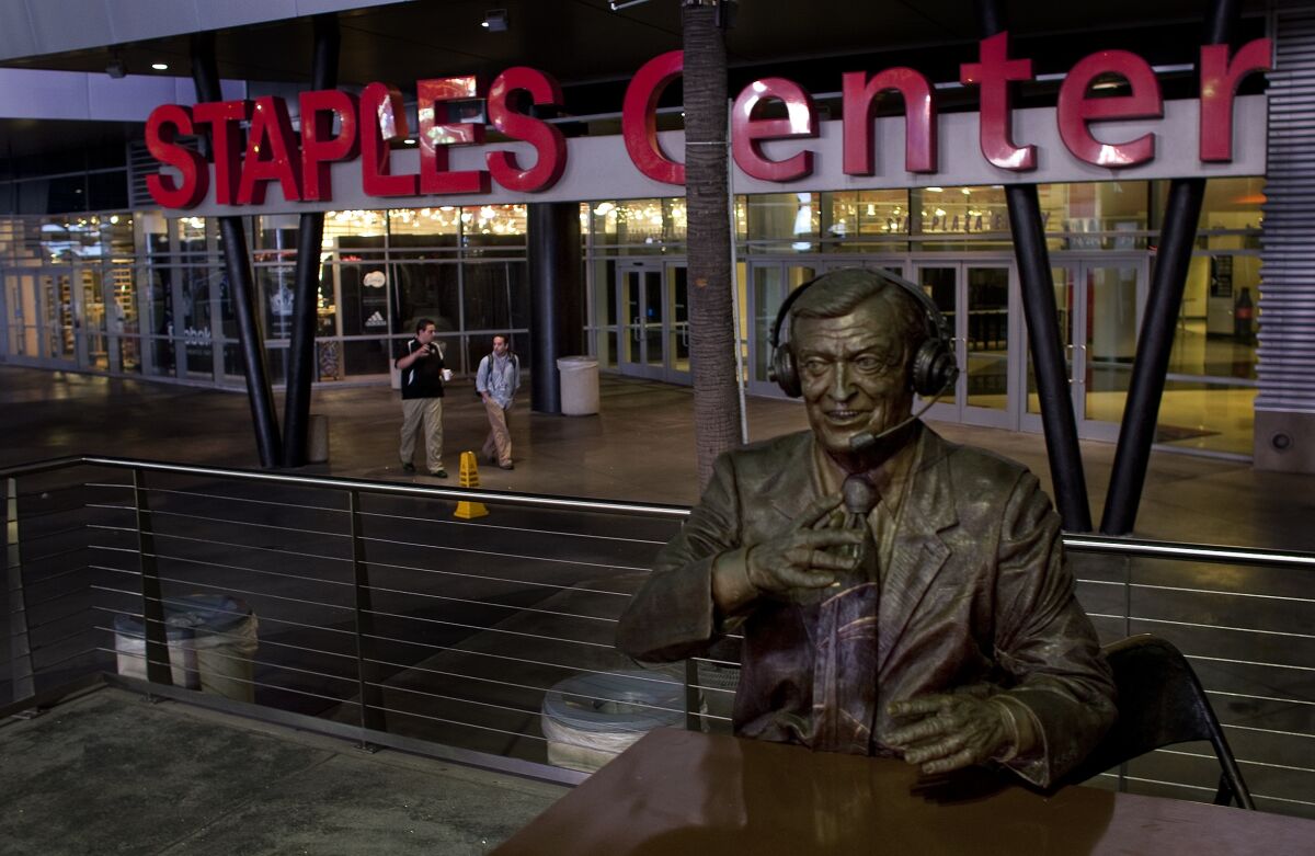 A statue of legendary Lakers broadcaster Chick Hearn outside Staples Center.