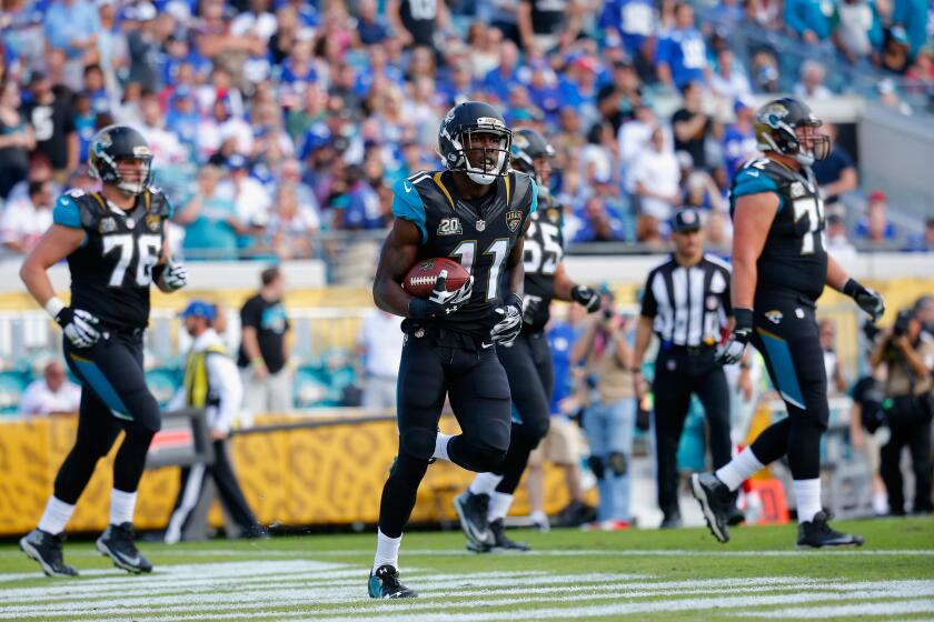 Former USC receiver Marqise Lee and the Jaguars face off with the Tennessee Titans Thursday night.