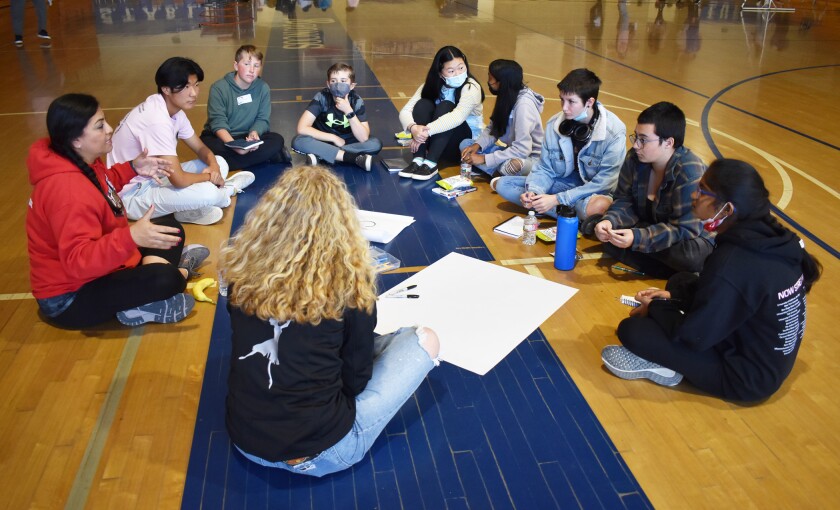 Bernardo Heights Middle School ASB Adviser Meera Navarro, far left, talking with her students.