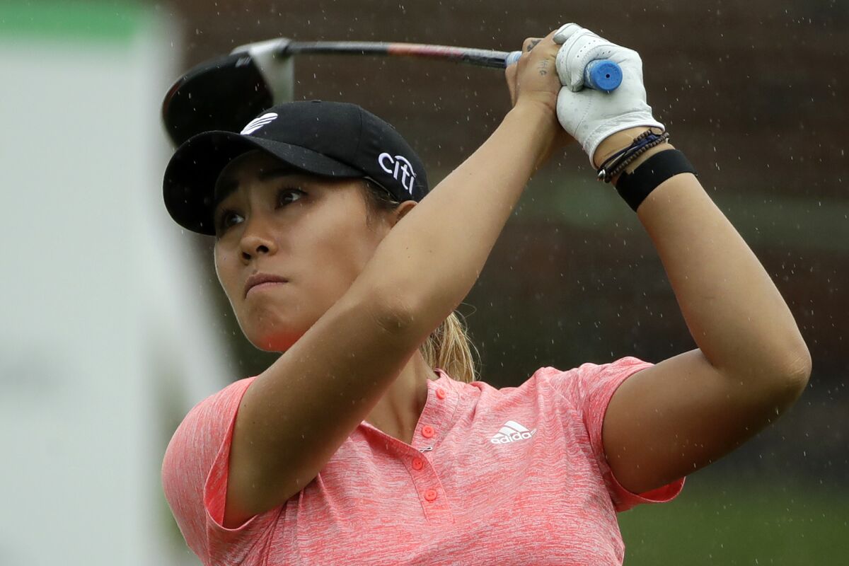 CORRECTS SPELLING OF FIRST NAME TO DANIELLE, N0T DANNIELLE - Danielle Kang watches her drive on the tenth hole during the second round of the LPGA Drive On Championship golf tournament Saturday, Aug. 1, 2020, at Inverness Golf Club in Toledo, Ohio. (AP Photo/Gene J. Puskar)