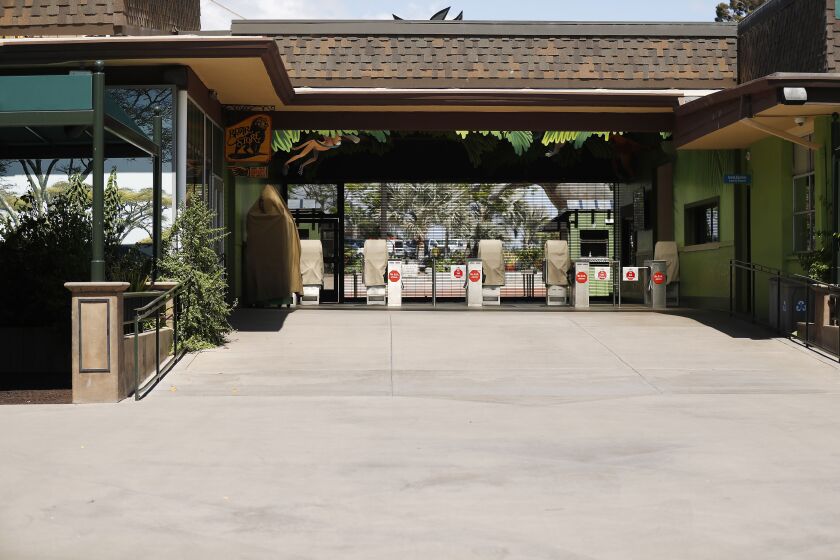 The San Diego Zoo entrance sits empty on May 19, 2020. The zoo has been closed during to coronavirus pandemic but workers have been caring for the animals throughout it.