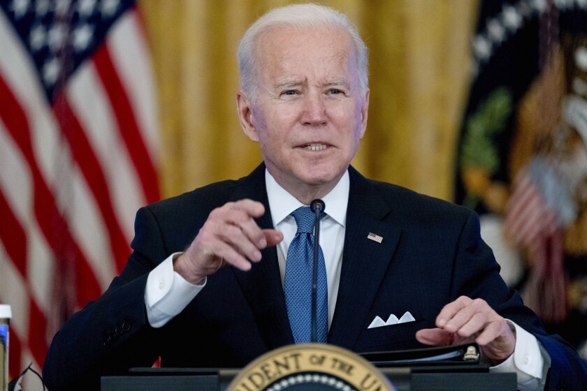 President Joe Biden responds to reporter's questions during a meeting on efforts to lower prices for working families, in the East Room of the White House in Washington, Monday, Jan. 24, 2022. (AP Photo/Andrew Harnik)