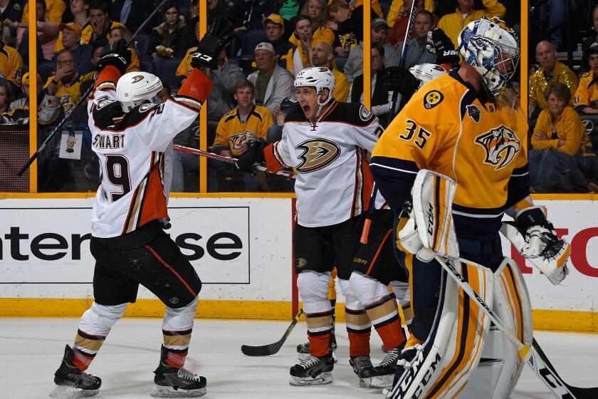 Shawn Horcoff and Chris Stewart of Ducks celebrate a goal against Predators goaltender Pekka Rinne during the second period of a game on April 21.
